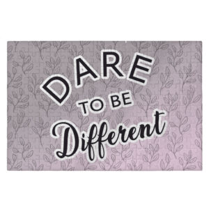 Colorful jigsaw puzzle with 'Dare to Be Different' design.