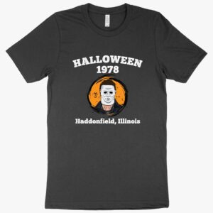 Join the horror legacy with our Halloween 1978 T-Shirt. A must-have for fans of the classic Halloween movie!