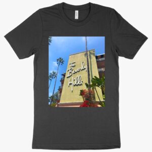 T-shirt featuring "Hills 90210 Beverly" text with iconic imagery.