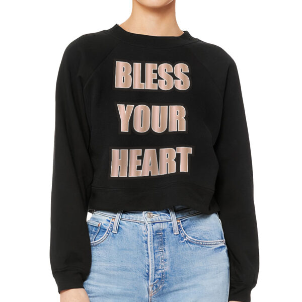 Raglan pullover sweatshirt with "Bless Your Heart" slogan.