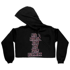 Cropped hoodie with "Not a Secret" statement quote design.