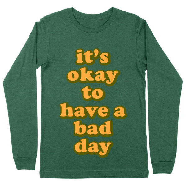 Long sleeve tee with "It's Ok" motivational statement.