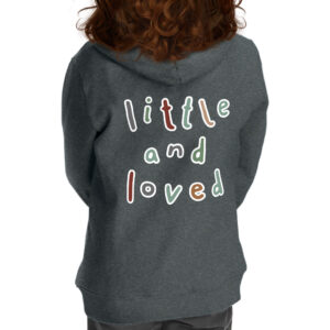 Adorable toddler wearing 'Little and Loved' full-zip hoodie.