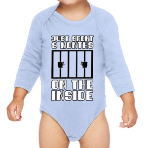 Baby wearing a cozy long sleeve onesie.