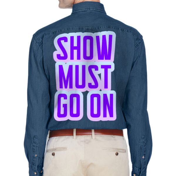 Front view of a man wearing a denim shirt with witty quotes.