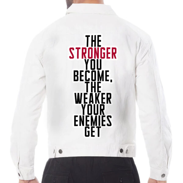 Front view of a man wearing a white denim jacket with motivational details.