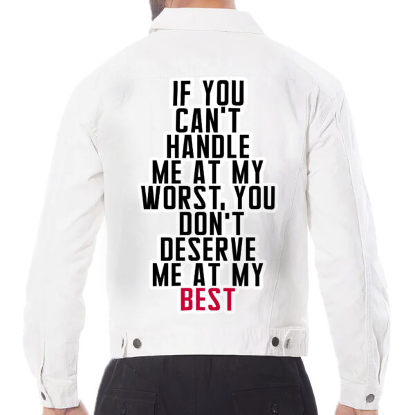 Front view of a man wearing a white denim jacket with cool sayings.