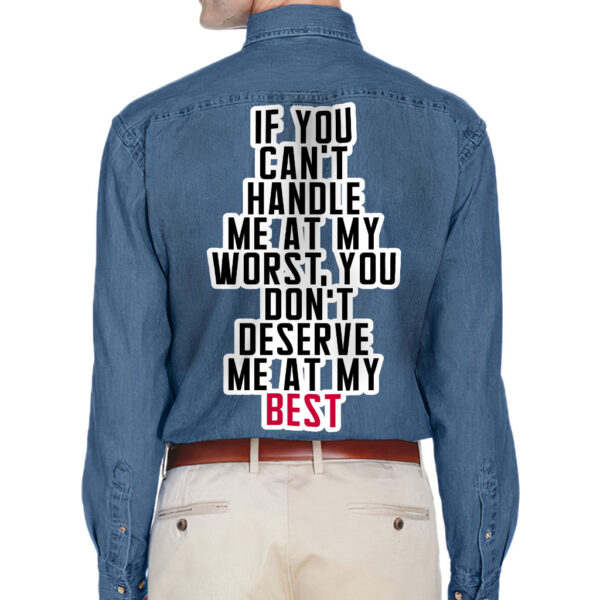 Front view of a man wearing a denim shirt with funny sayings.